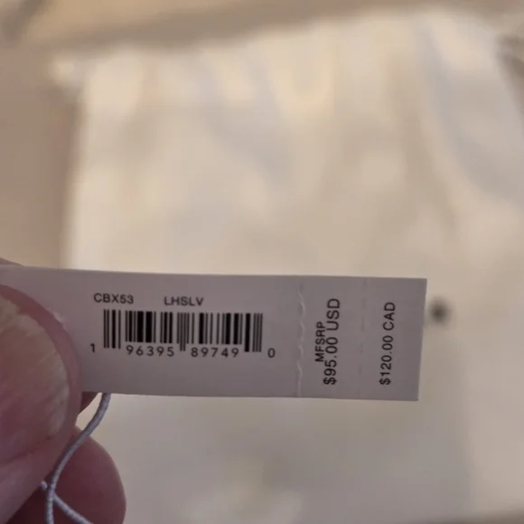 Coach | The Summer I Turned Pretty | Infinity Silver and Gold Keychain Bag Charm - Picture 13 of 16